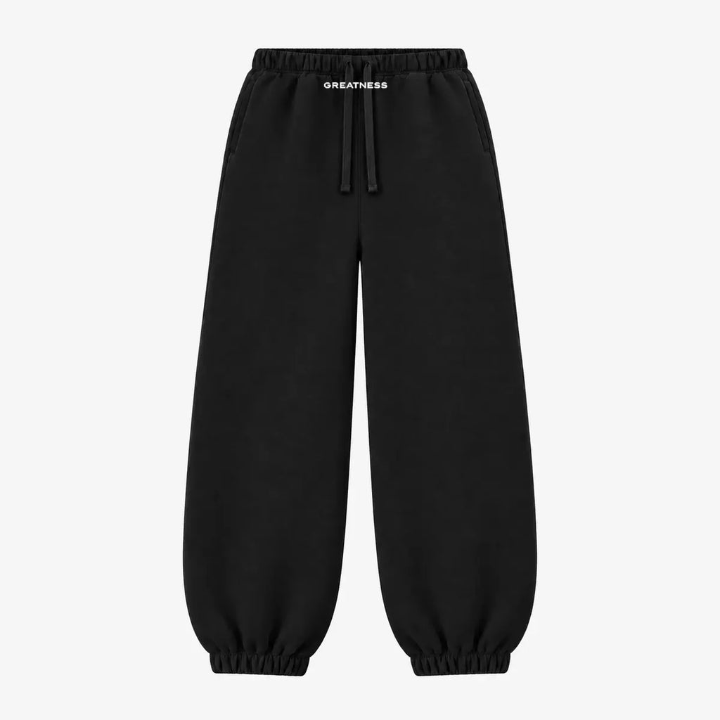 Pantalone tuta streetwear con polsino GREATNESS in nero, vista frontale