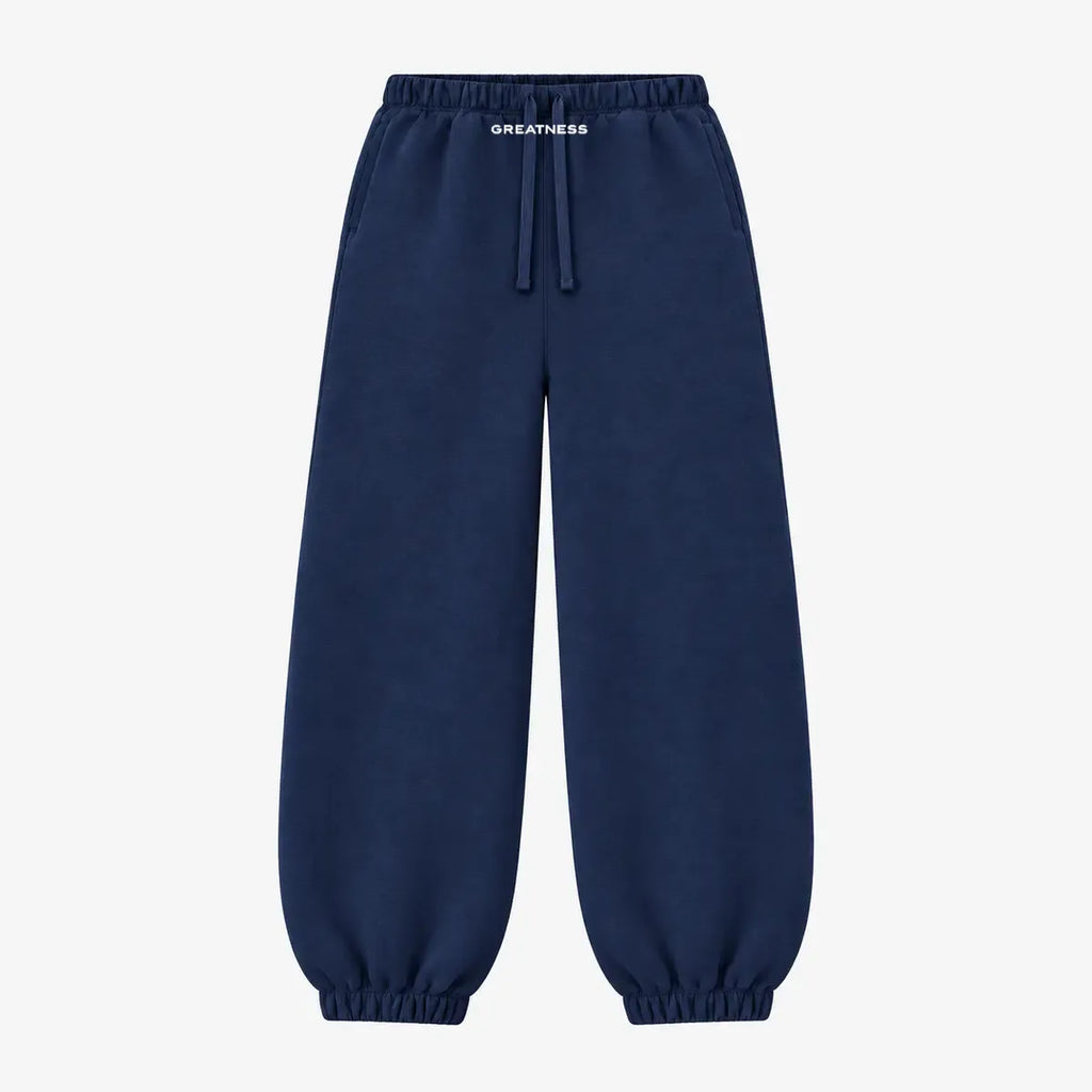 Pantalone tuta streetwear con polsino GREATNESS in blu navy, vista frontale