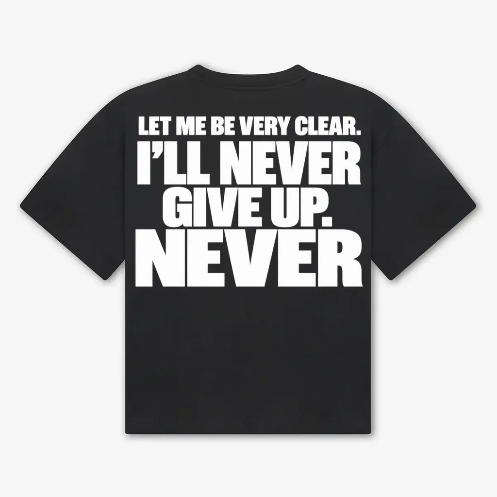 Maglietta boxy Never Give Up GREATNESS in nero, retro